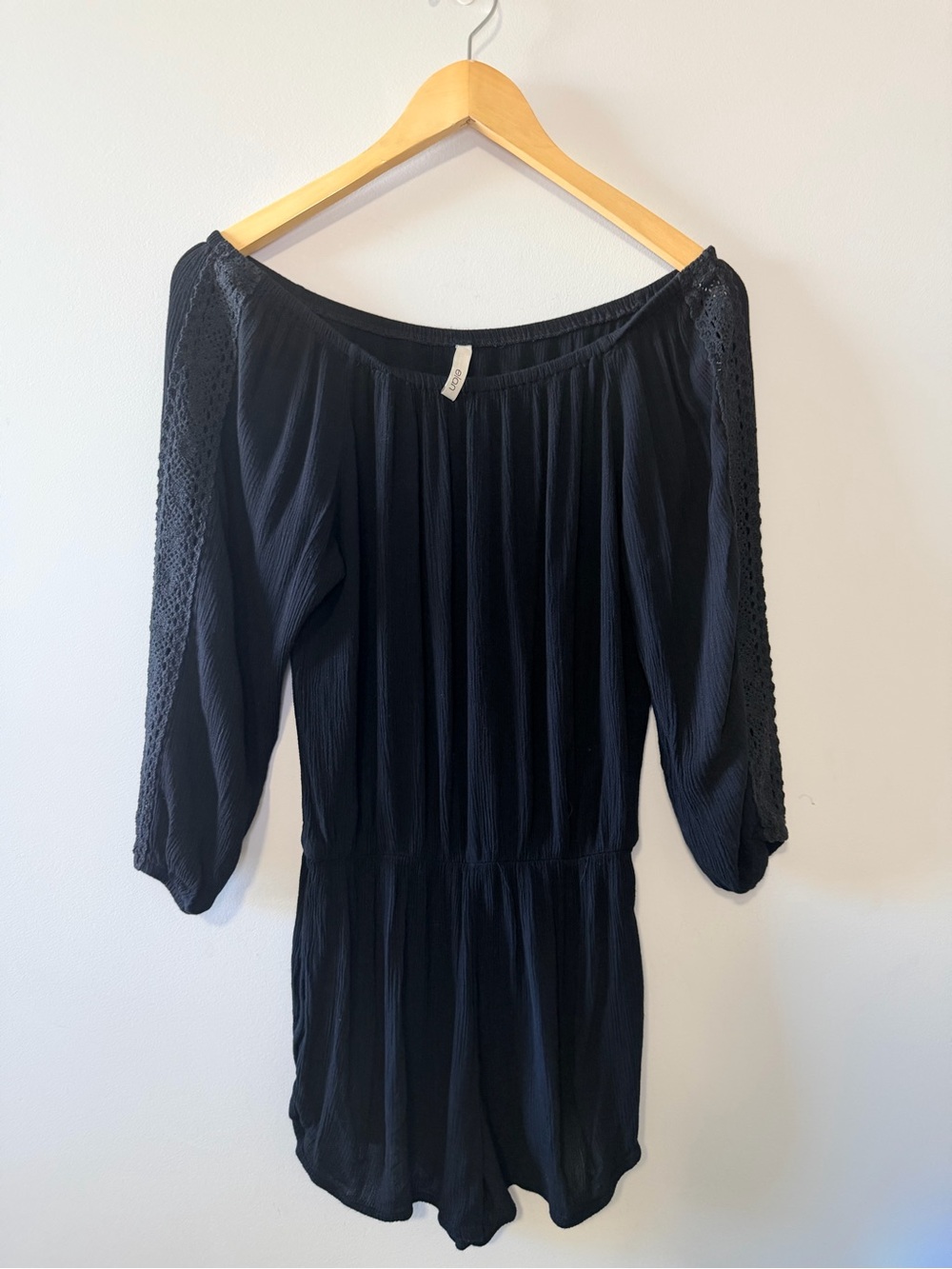 Womenโs Black Off-Shoulder Romper Dress